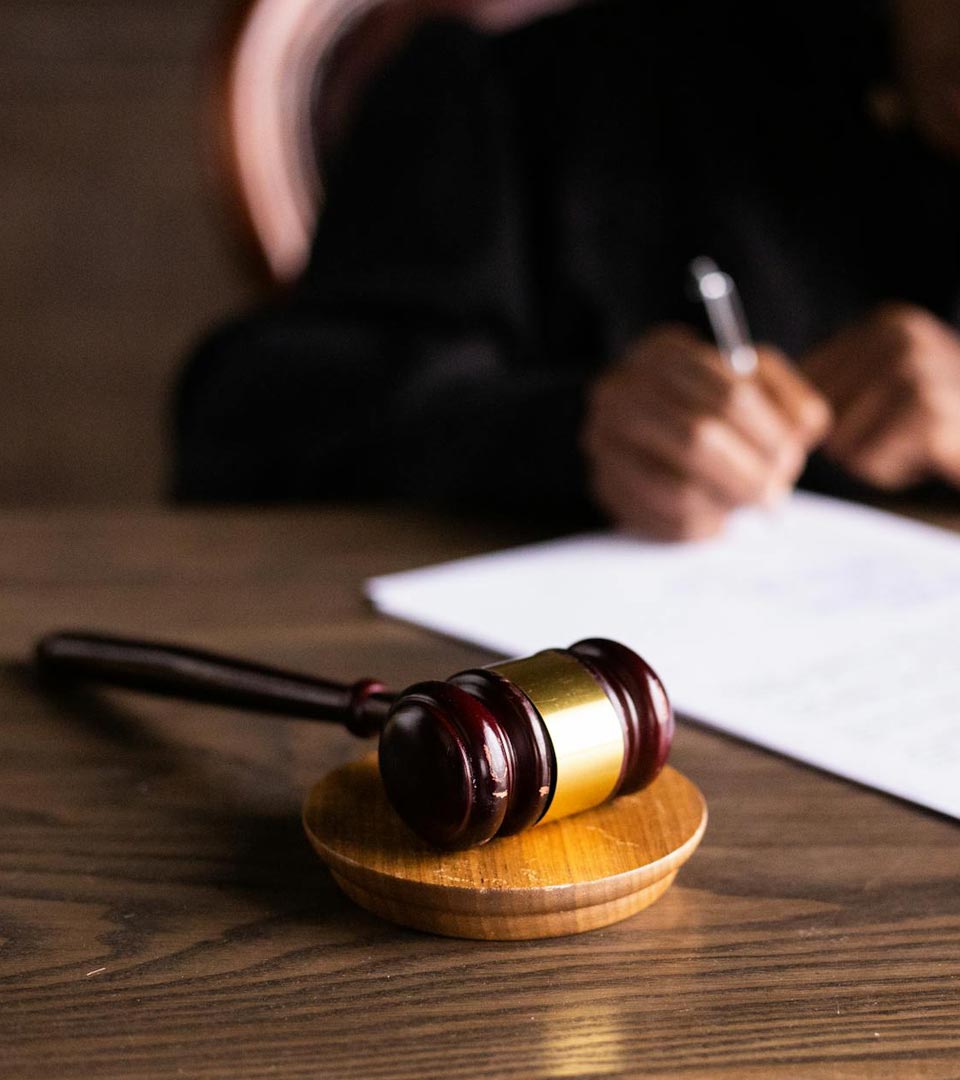Person Signing Legal Form Gavel Vertical pexels-ekaterina-bolovtsova-6077447